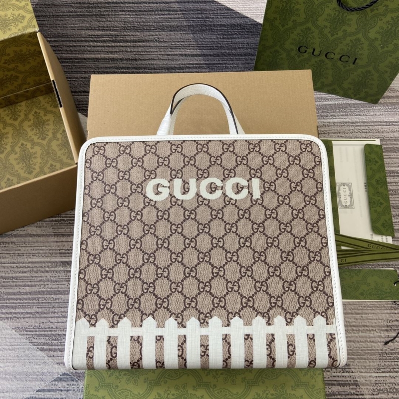 G*u*i shopping bags